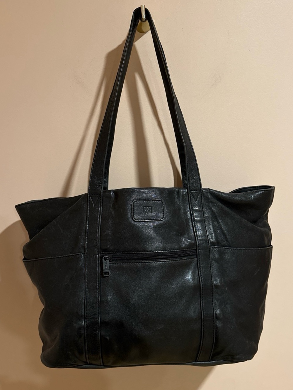 Tumi Black leather tote bag